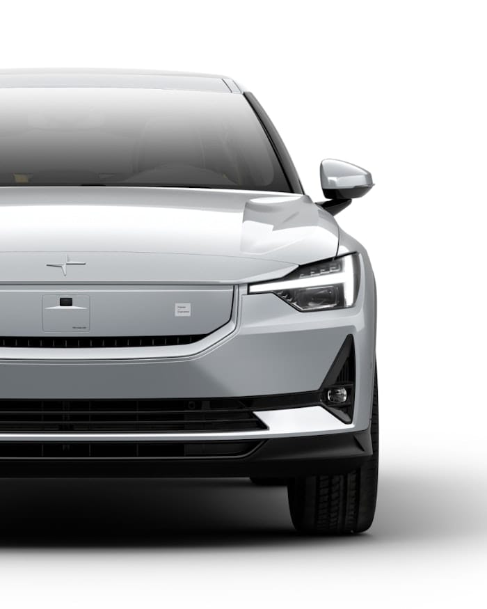 A front view of the Polestar 2 with a light metallic grey exterior.
