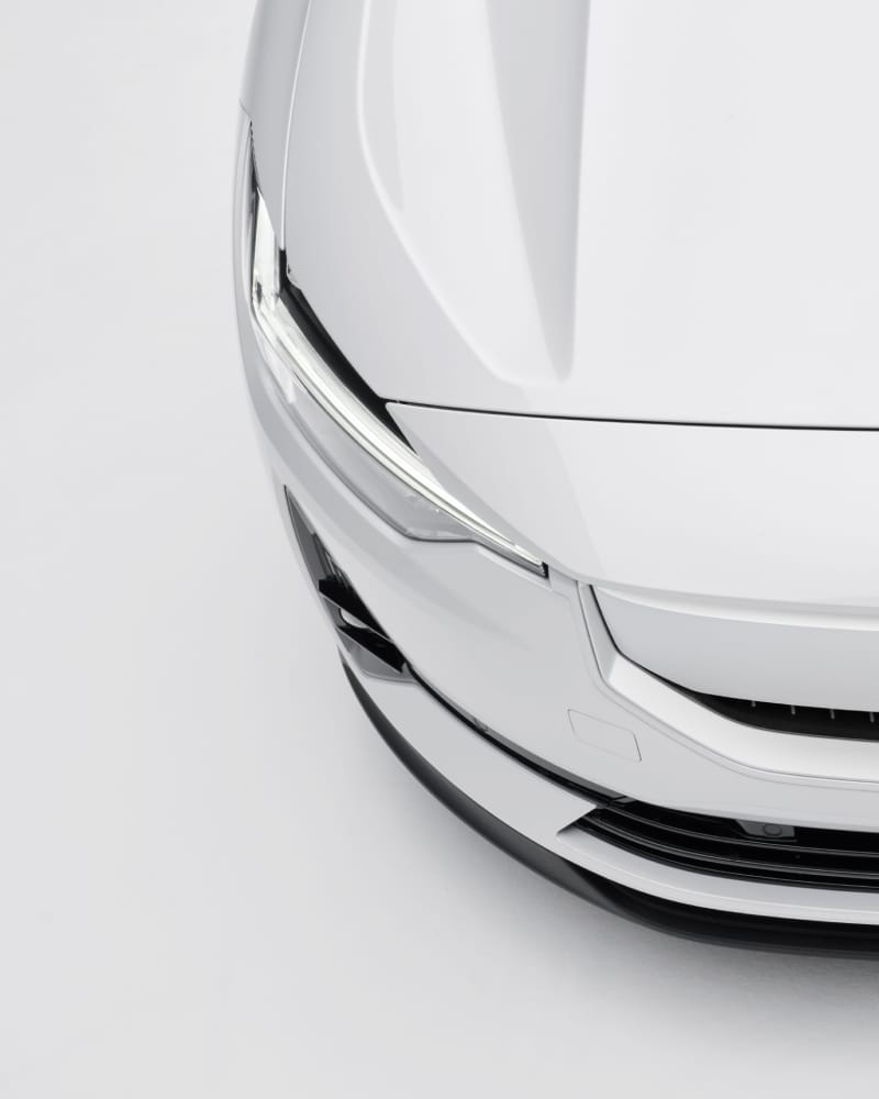 Close-up on the front of the Polestar 2 from above showing the area with active high beam