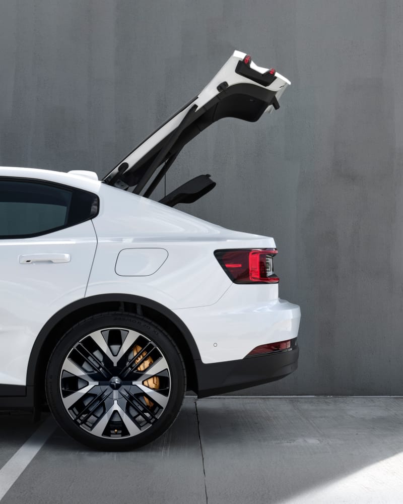 Open tailgate on a white Polestar. Half the car is visible in the picture