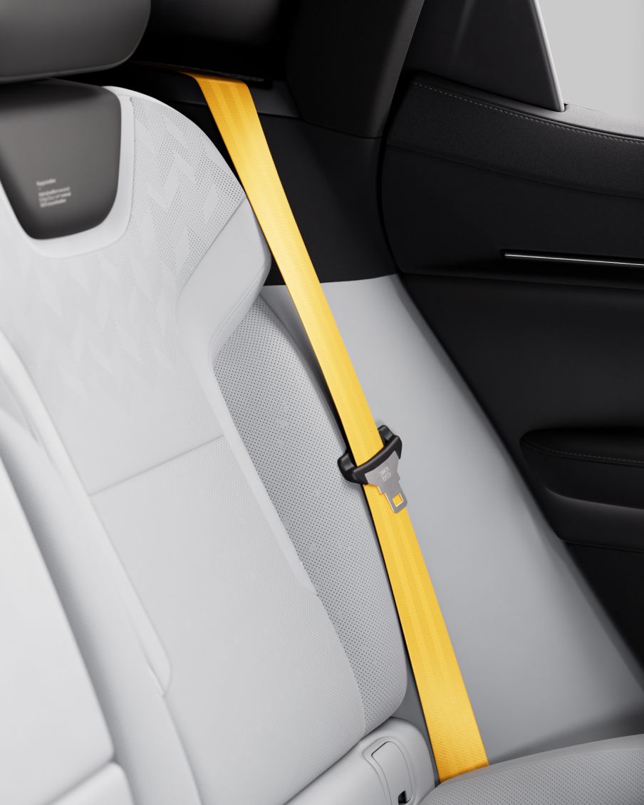 Yellow seatbelts on the seats.