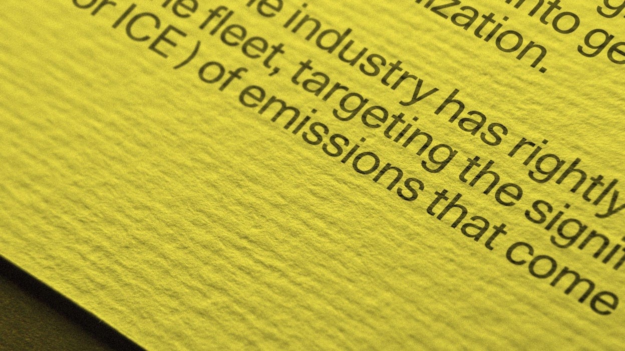 Close up of black text on yellow paper