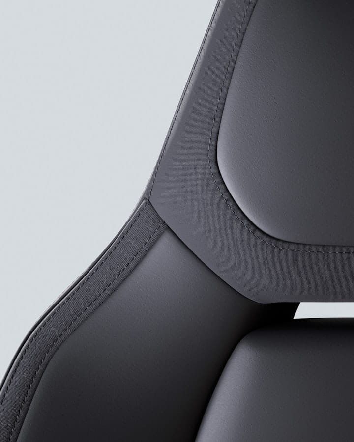 Detail of Polestar 4 front seat with Charcoal MicroTech upholstery