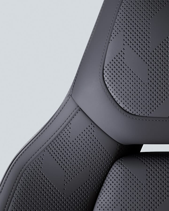 Detail of Polestar 4 front seat with Charcoal Nappa leather upholstery