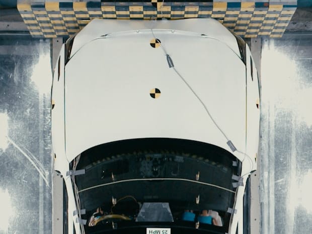 Close up seen from above of a car in studio crash test