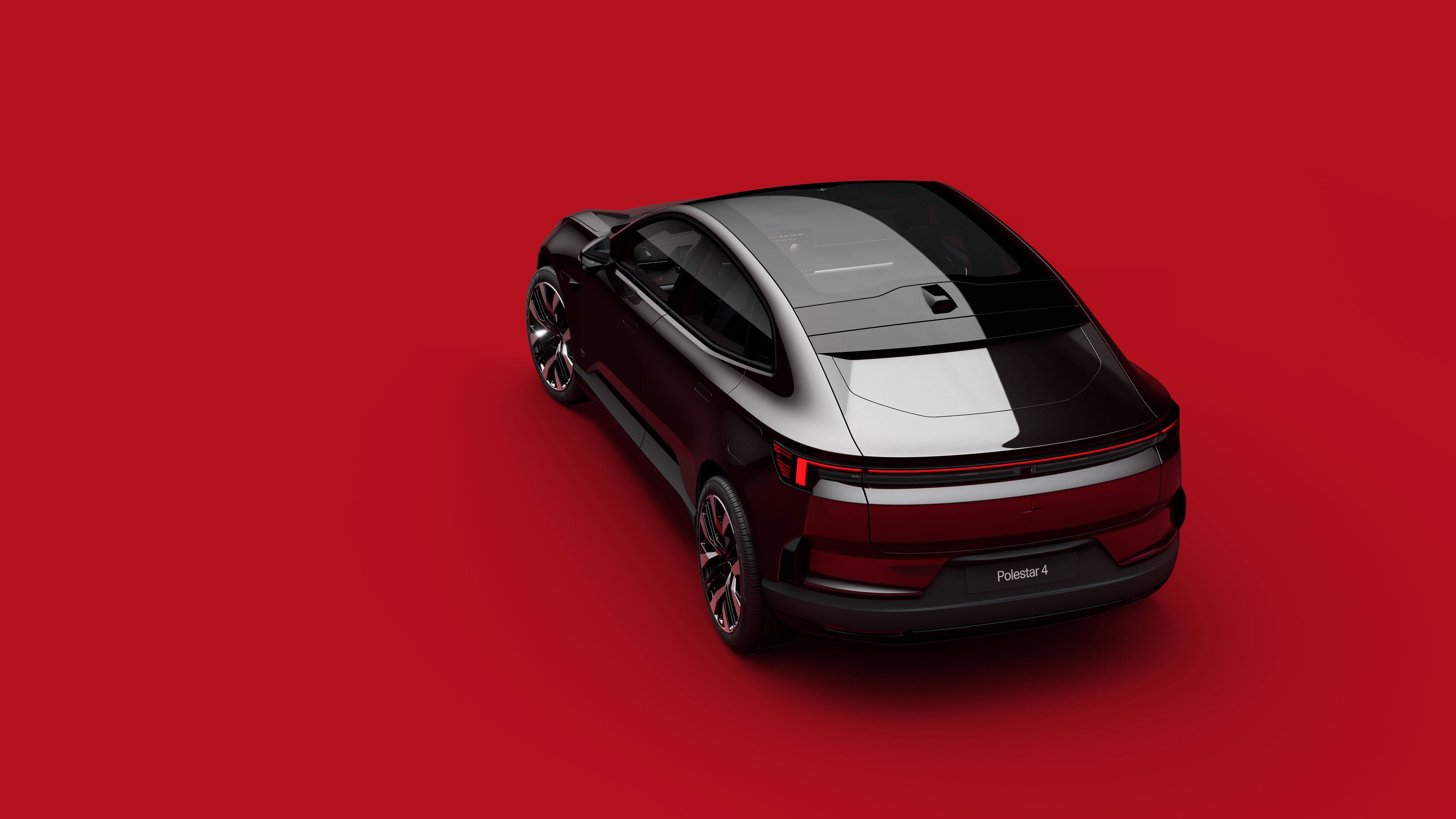 Black Polestar 4, red background