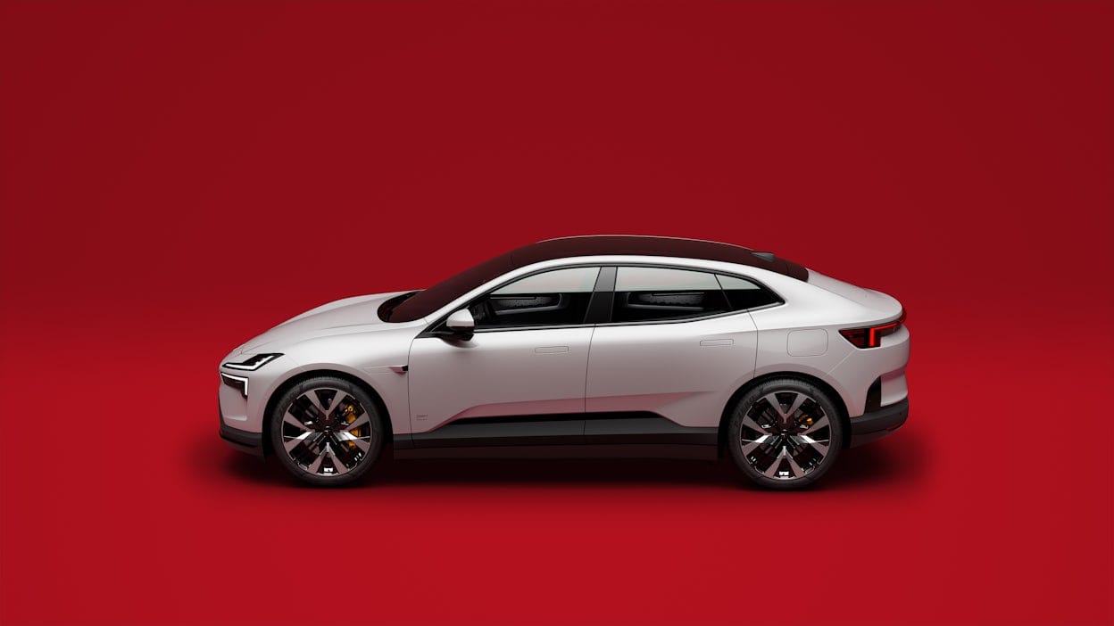 Polestar 4 seen from the side. Red background
