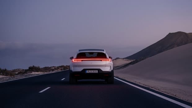 polestar 3 shown from behind driving on the road