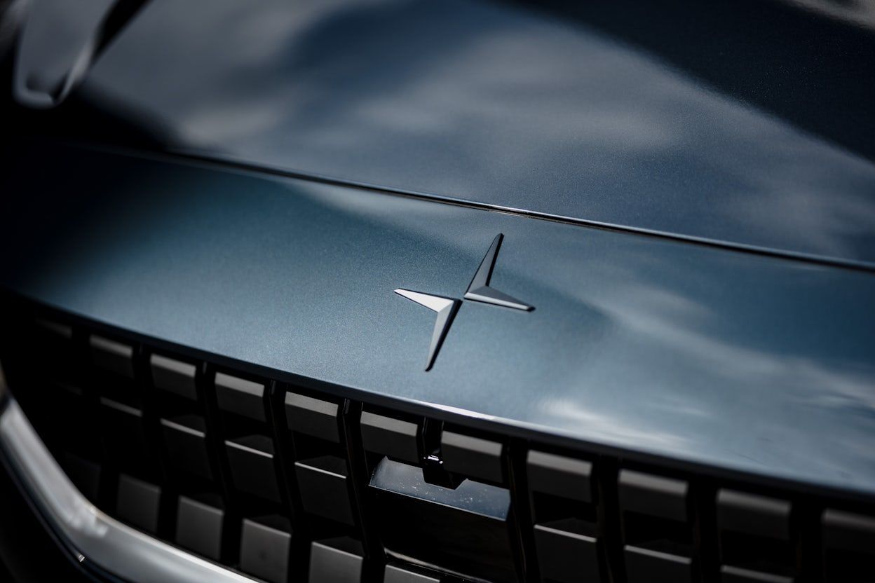 Close up of the Polestar logo in the front of the car