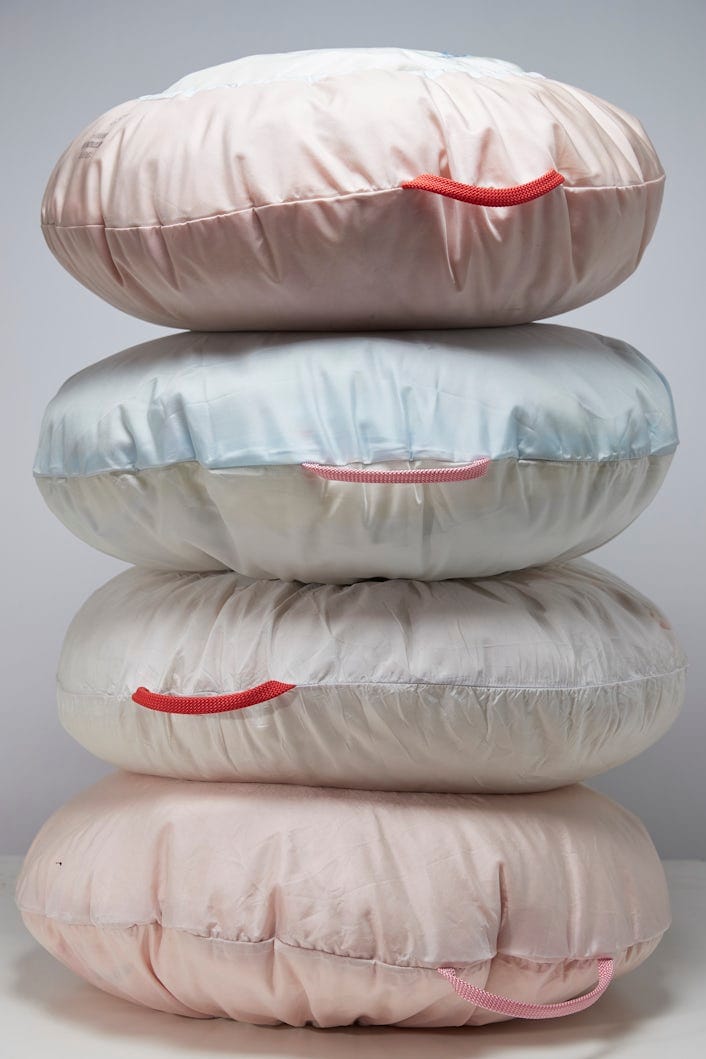 Four airbags stacked on each other