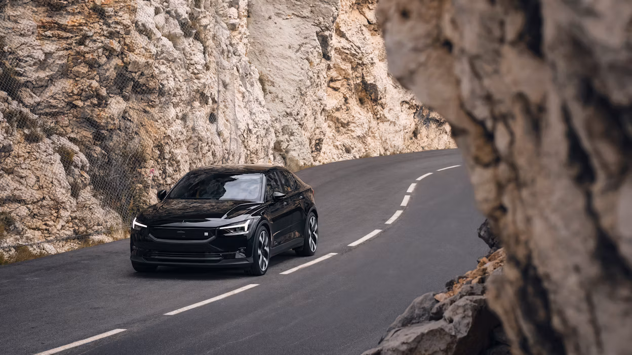 Polestar 2 driving through the mountains