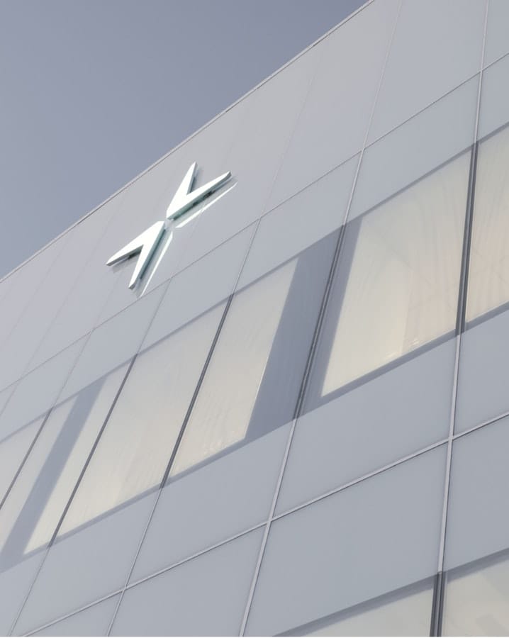 The Polestar logo on a building wall.