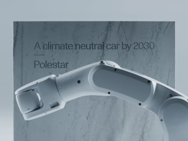 Robotic arm engraving "A climate neutral car by 2030 - Polestar" in stone