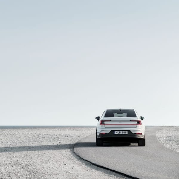 Back of the Polestar 2 with exterior snow on desert background