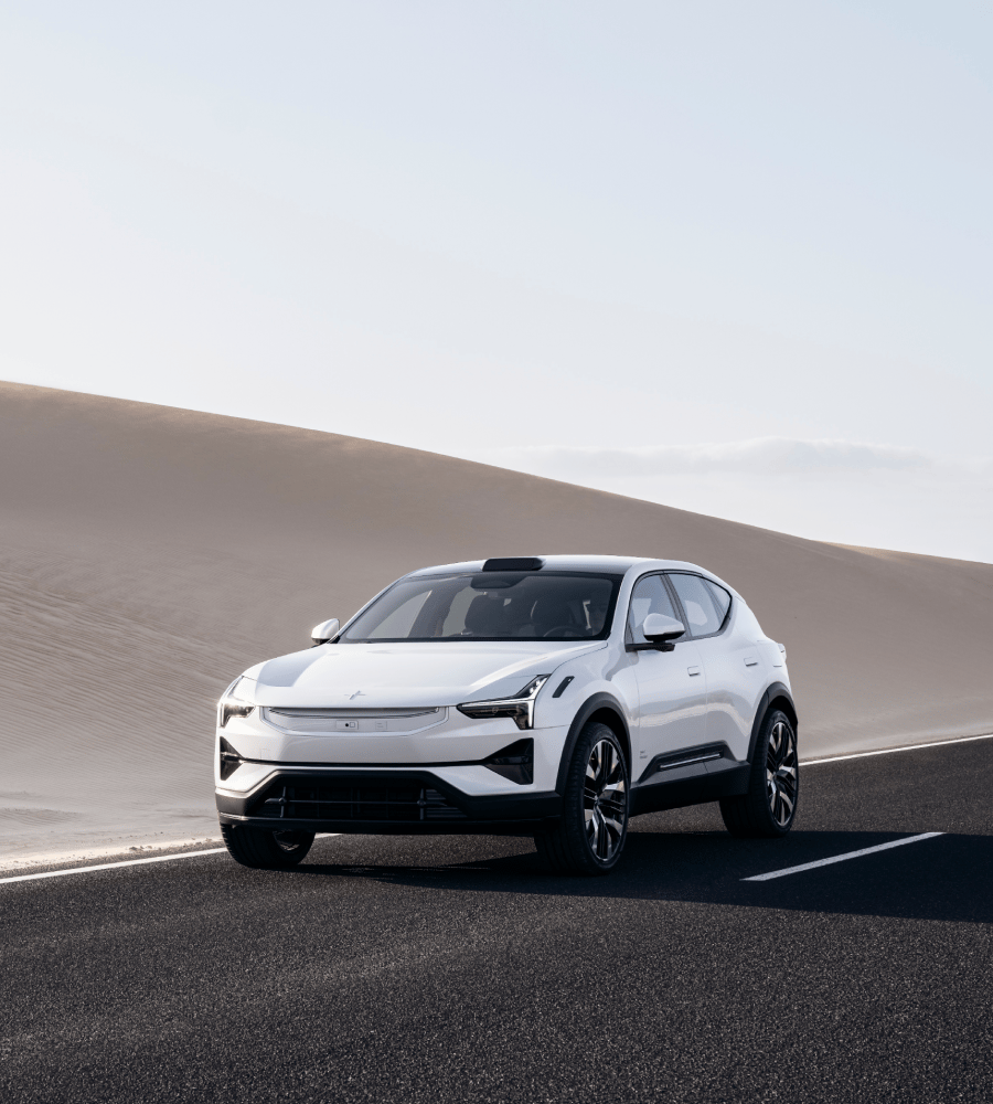 White Polestar 3 standing on a road in a desert.