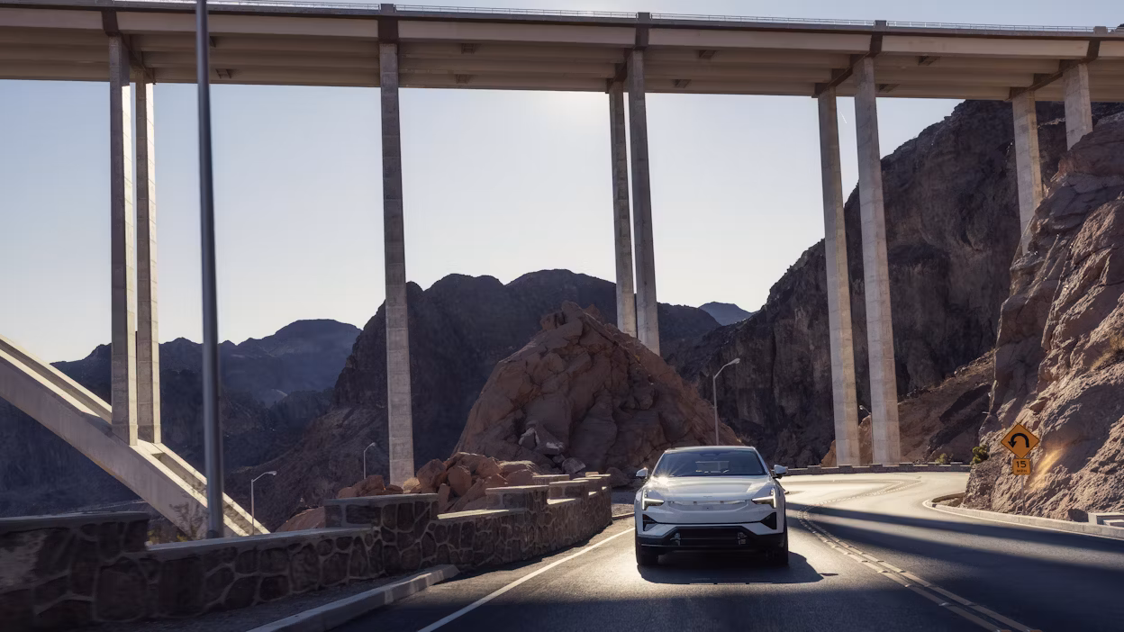 Polestar 3 driving under a bridge