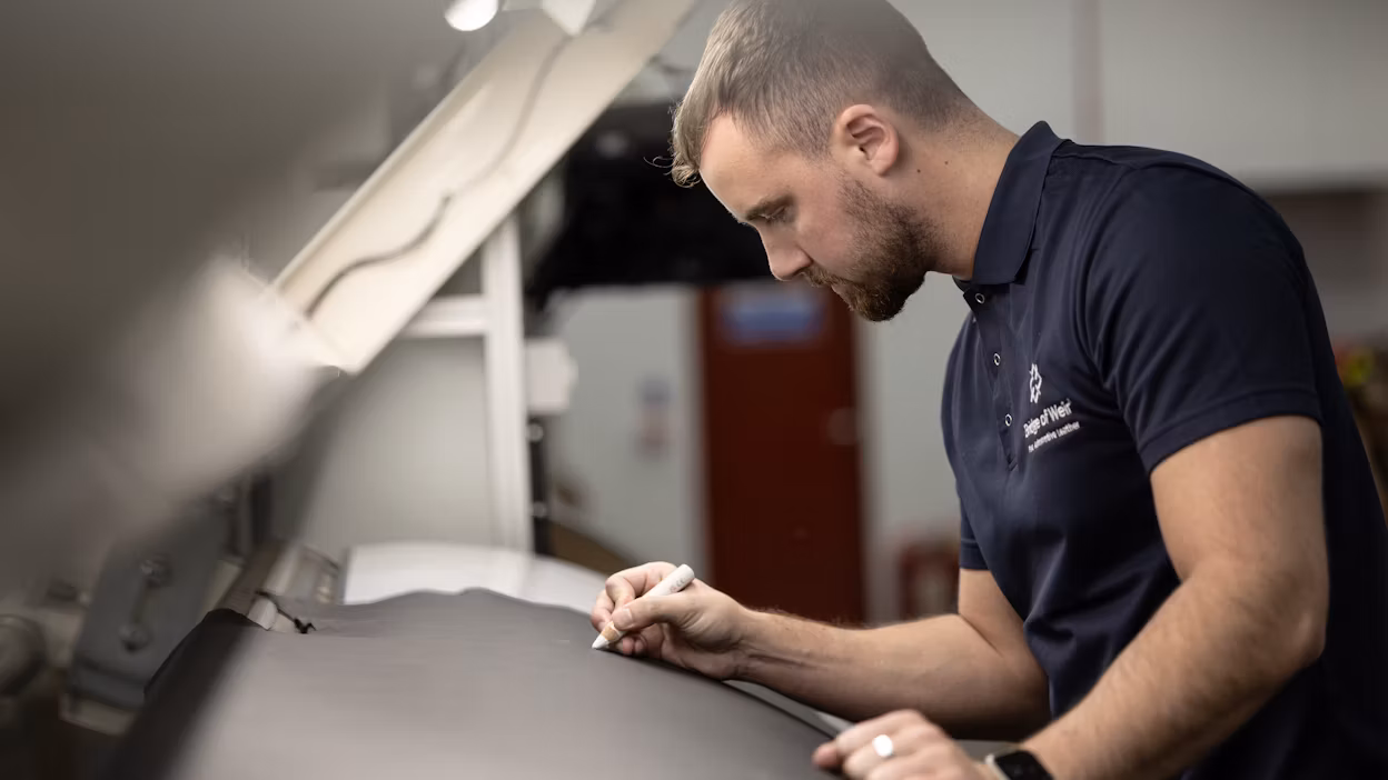 Checking the leather for natural characteristics.