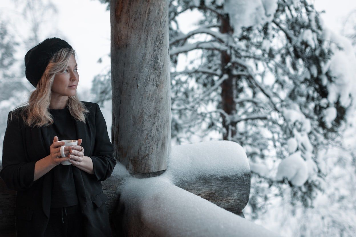 Tanja Sotka enjoying some warm tea out in the cold.