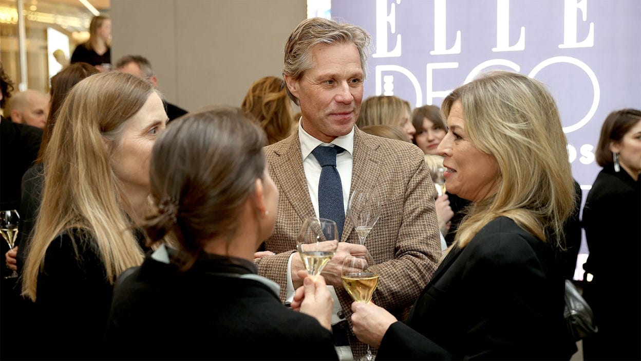Four participants mingling during the Elle Decoration Awards
