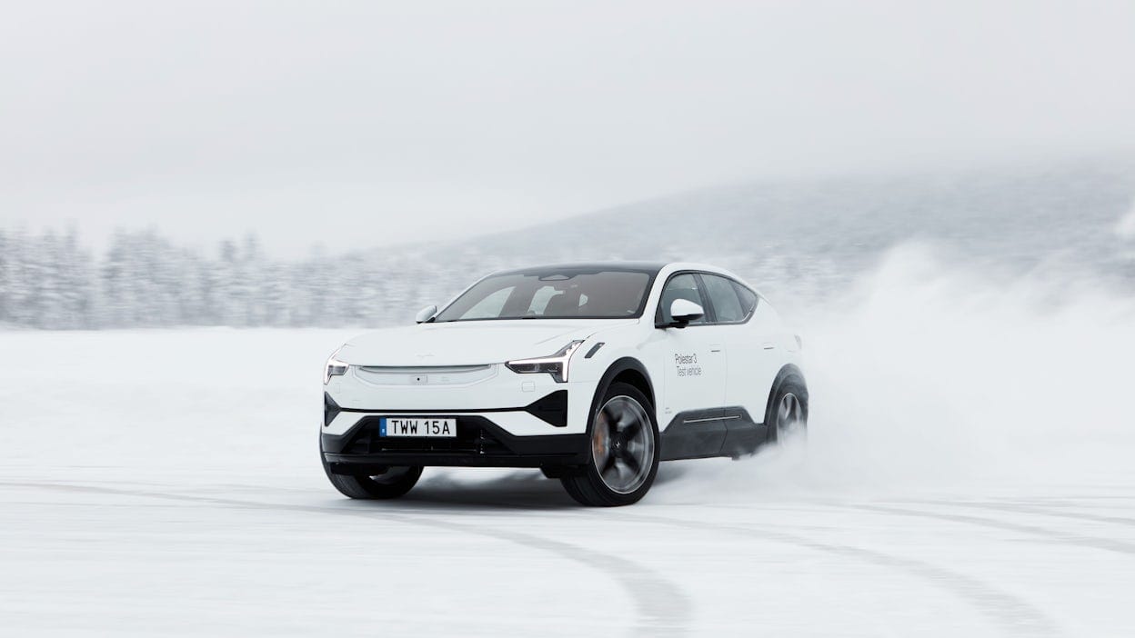 Polestar 3 in Snow colour driving on track on ice.