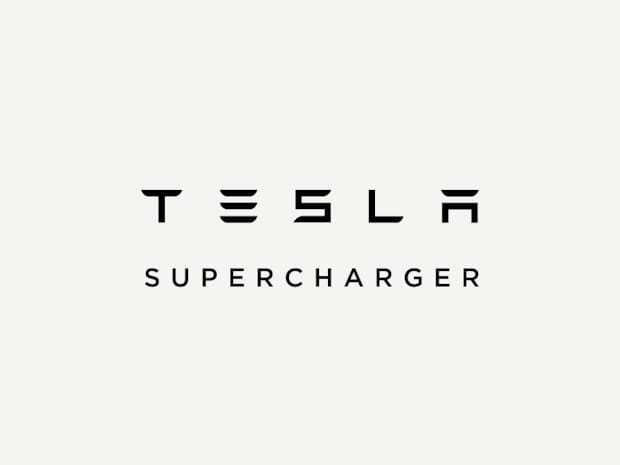 Tesla Supercharger logo on a grey background.