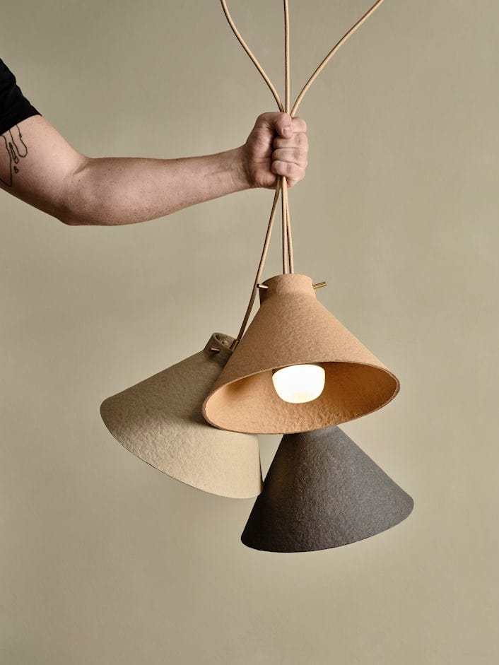 Arm holding hanging lamps