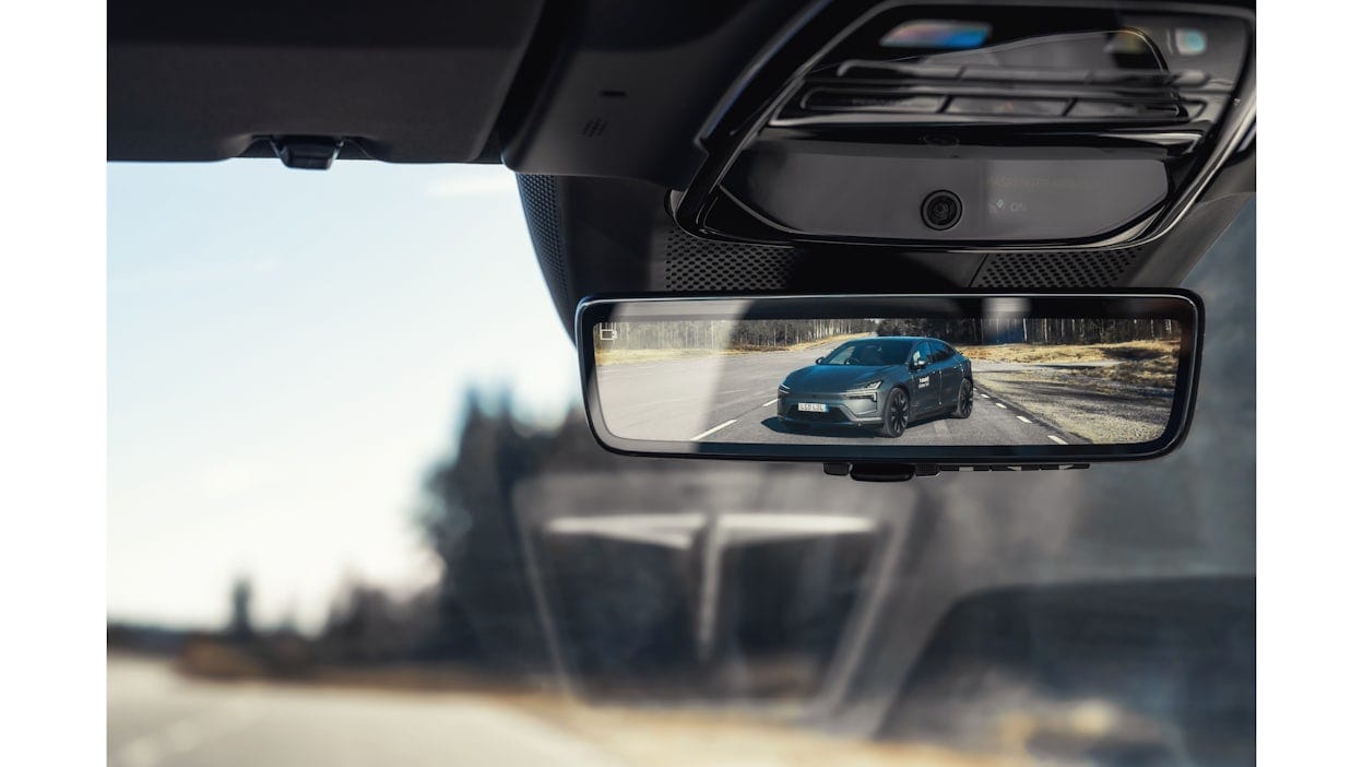 Polestar 4 shown through the rearview mirror of another Polestar 4.