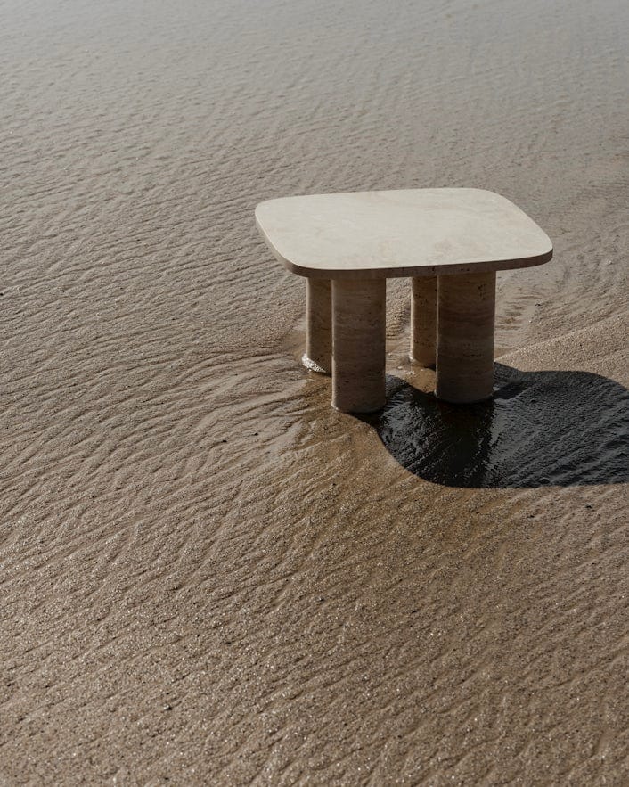 Table on sandy beach