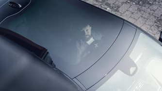 Polestar car windshield with interior view and exterior reflection.