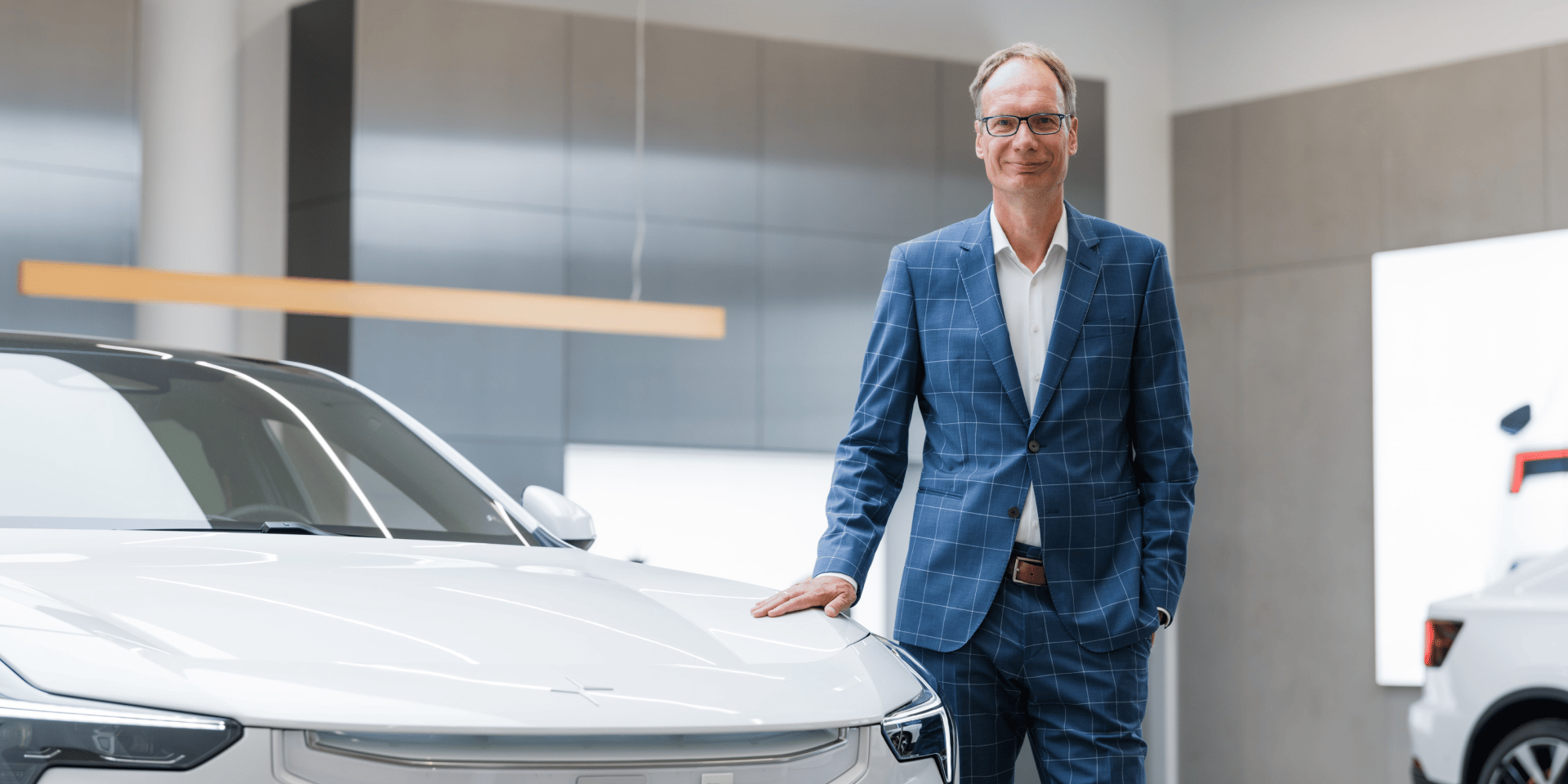 Man standing beside Polestar 3