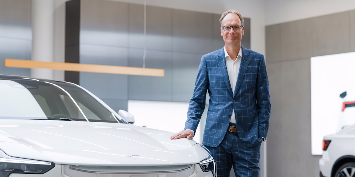 Man standing beside Polestar 3