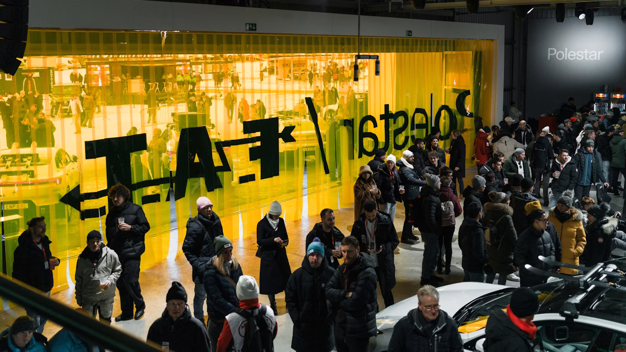 A busy Polestar hanger with yellow curtain