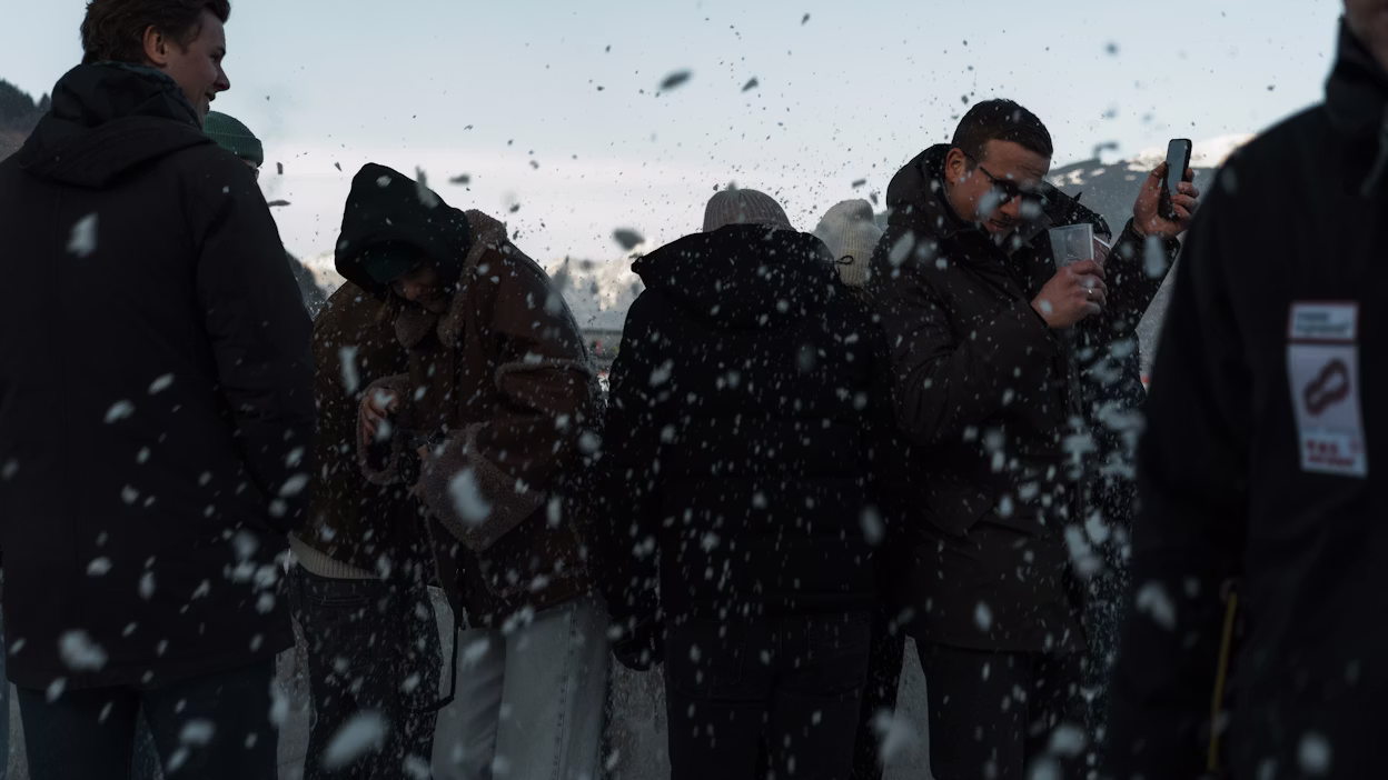 Spectators get sprayed with snow