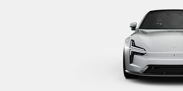 Front view of Polestar 5 car with headlights and windshield visible against a white background.
