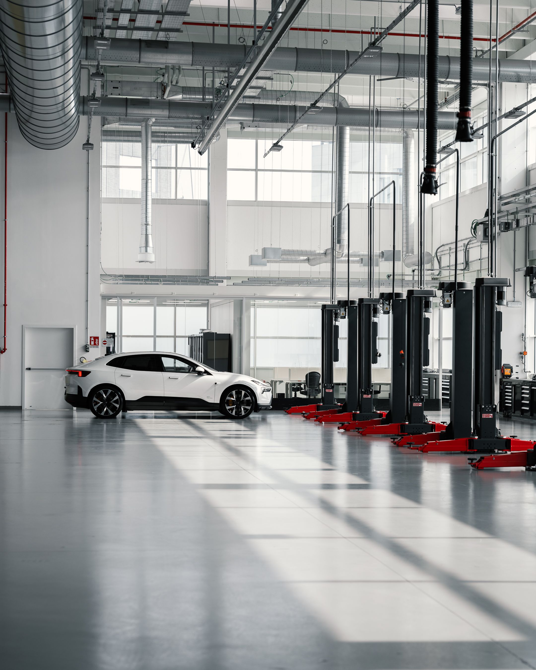 Polestar 4 in clean, minimalist workshop
