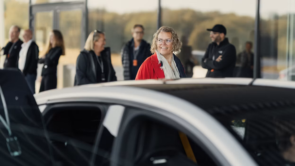 Happy Polestar ownes wit a car in the foreground
