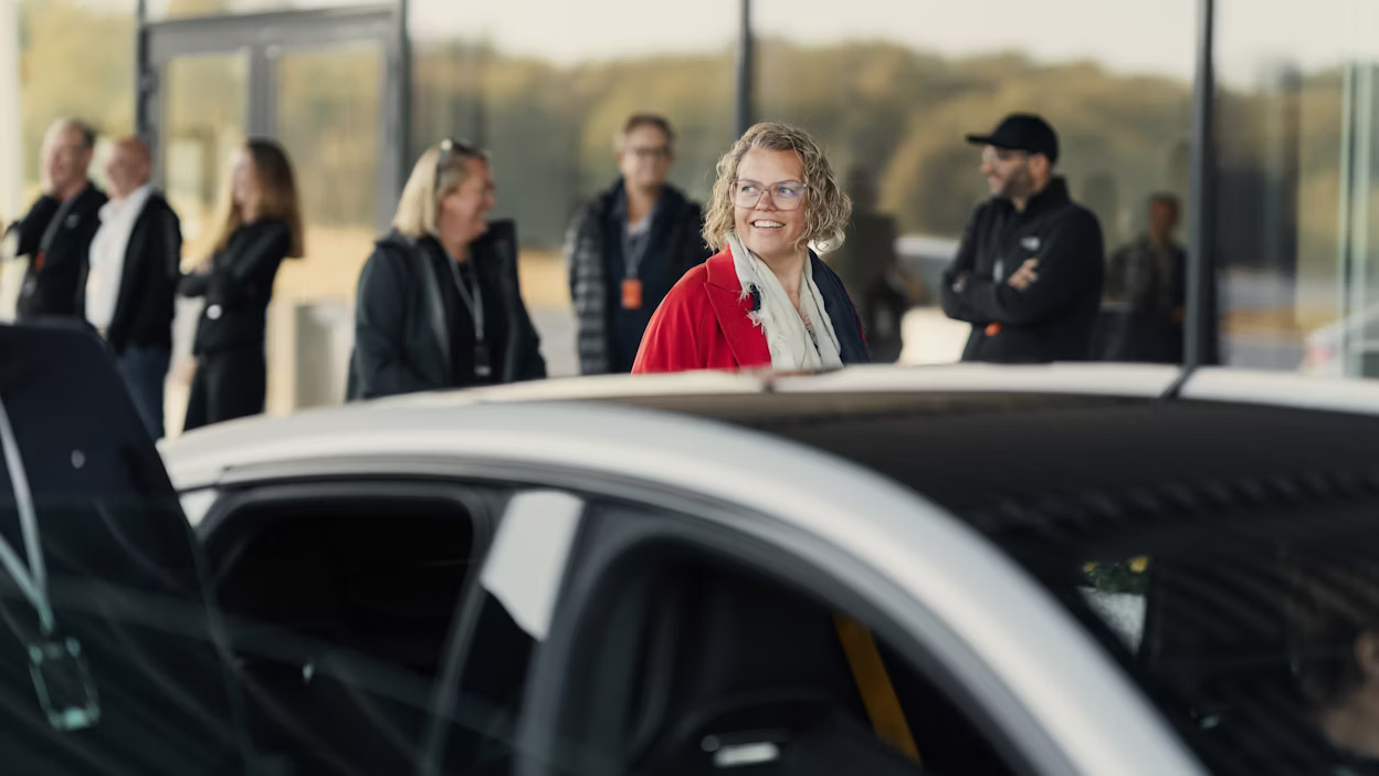 Happy Polestar ownes wit a car in the foreground