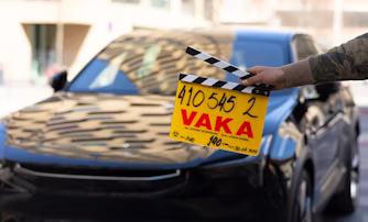 Polestar 3 on set with yellow clapperboard