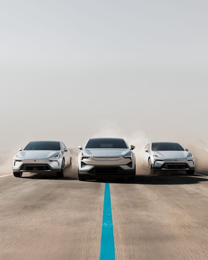Polestar 4, Polestar 3 and Polestar 2 driving on a dirty road in line with a blue line in the middle