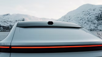Back of Polestar 4 in front of mountains