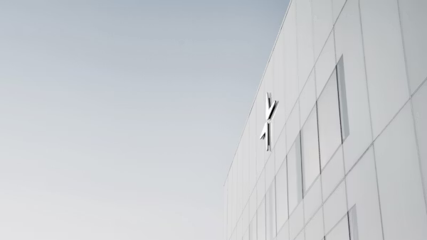 The white facade of Polestar HQ with the logo on top