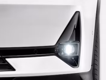 Front headlight and tire of a Polestar car.