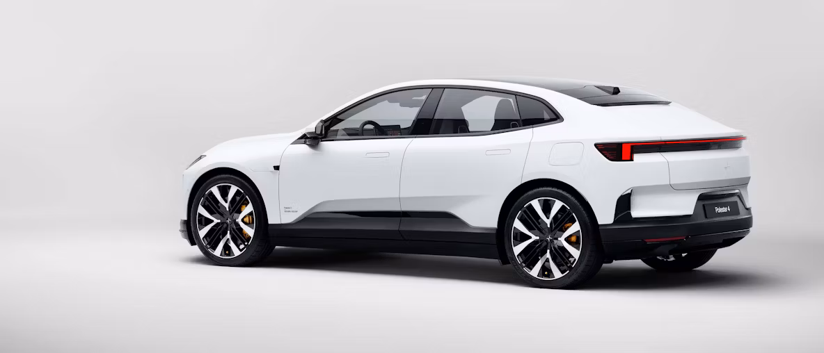 Polestar car in white color, rear and side view, parked on a plain surface with a neutral background.