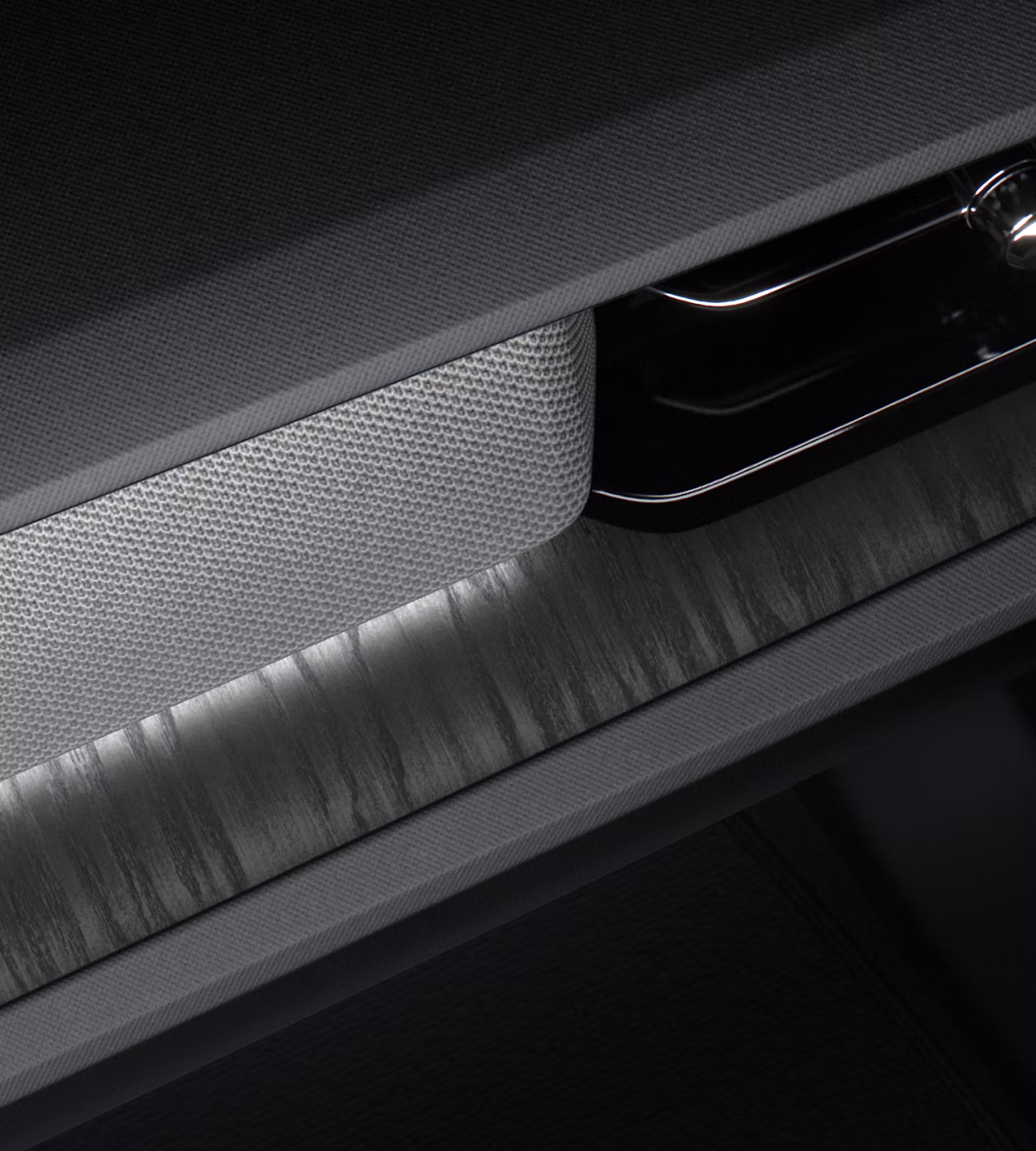 Polestar 2’s Black Ash deco illuminated with interior lighting.