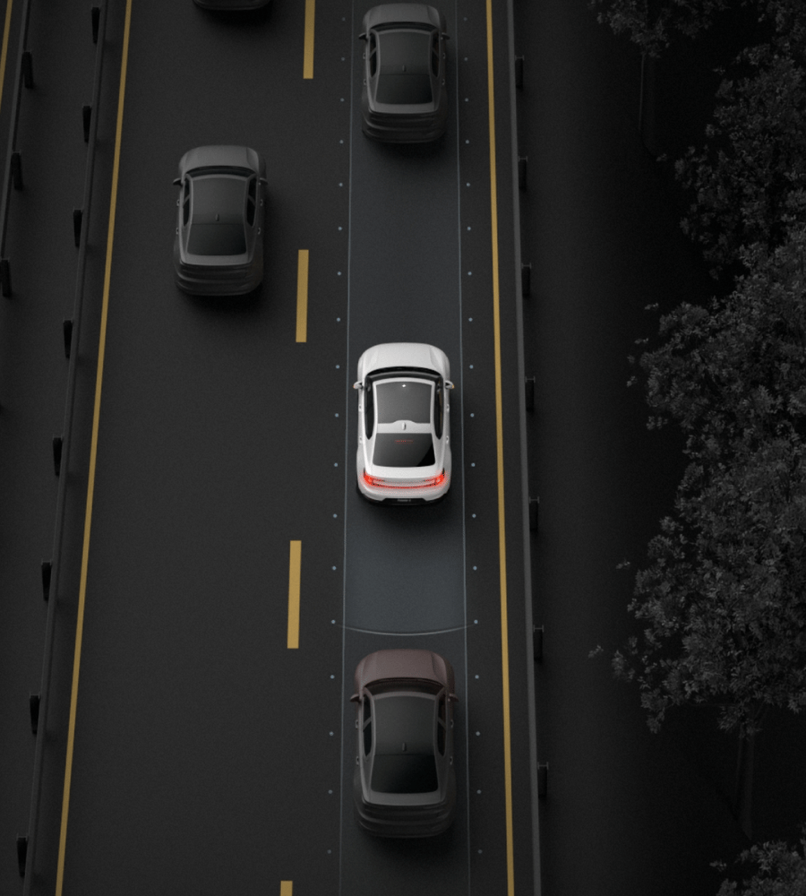 Polestar 2 makes a full stop and flashes its brake lights before reaching suddenly stopped traffic.