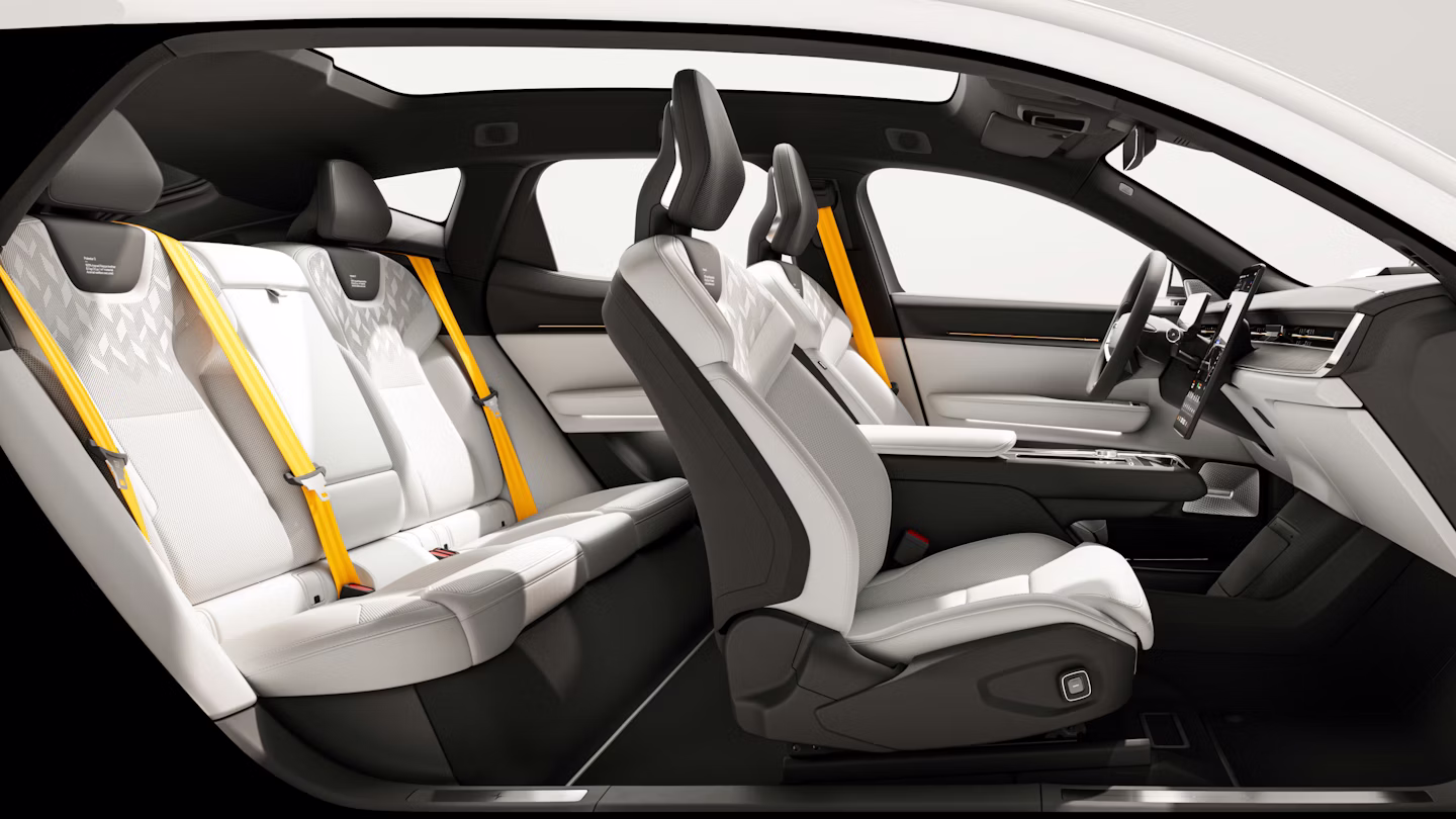 Polestar 3 interior showing all seats with Zinc perforated Nappa leather and Swedish gold seat belts.