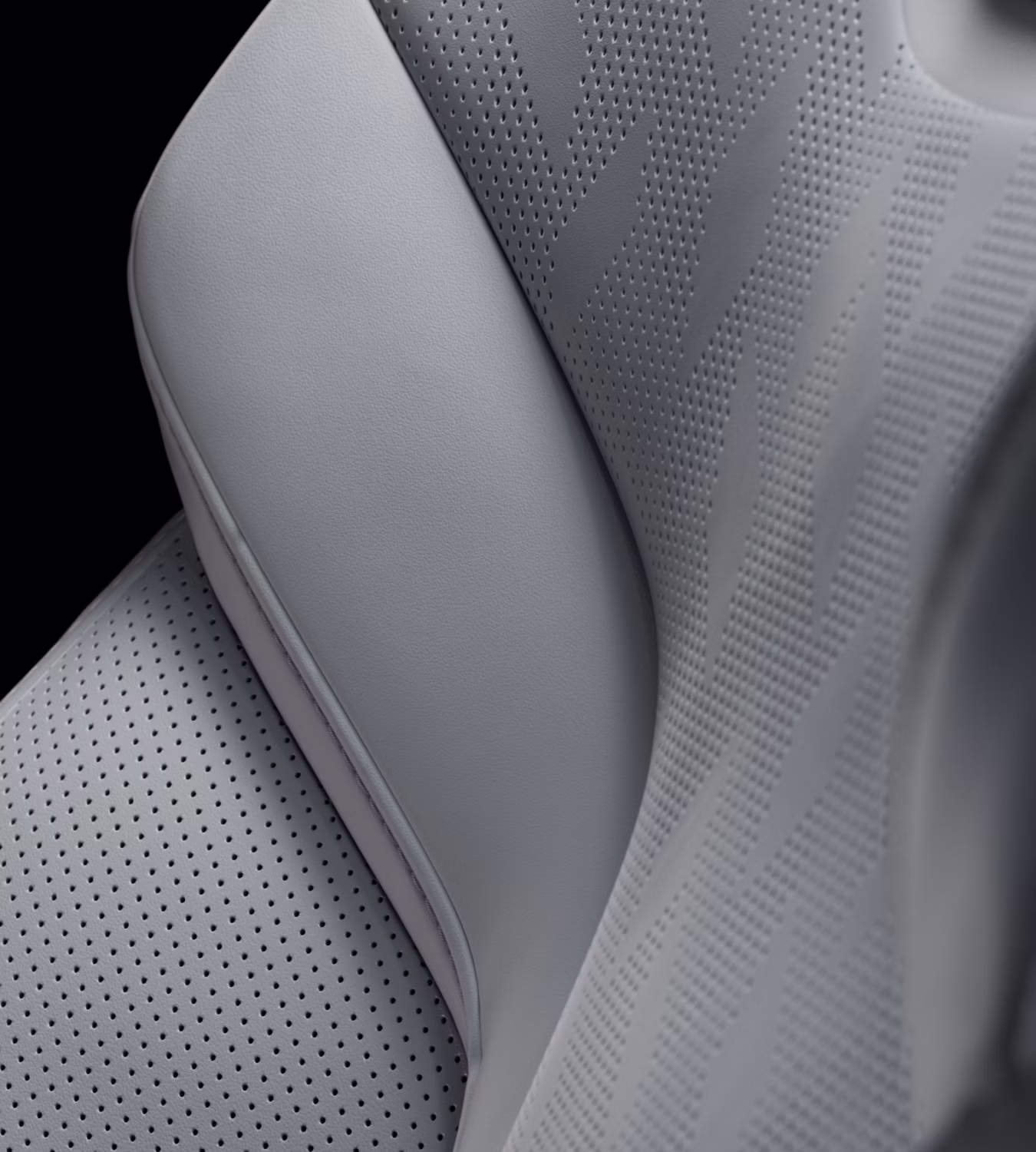Close-up of Polestar 3’s seat with perforated Nappa leather in Zinc with textured patterns.