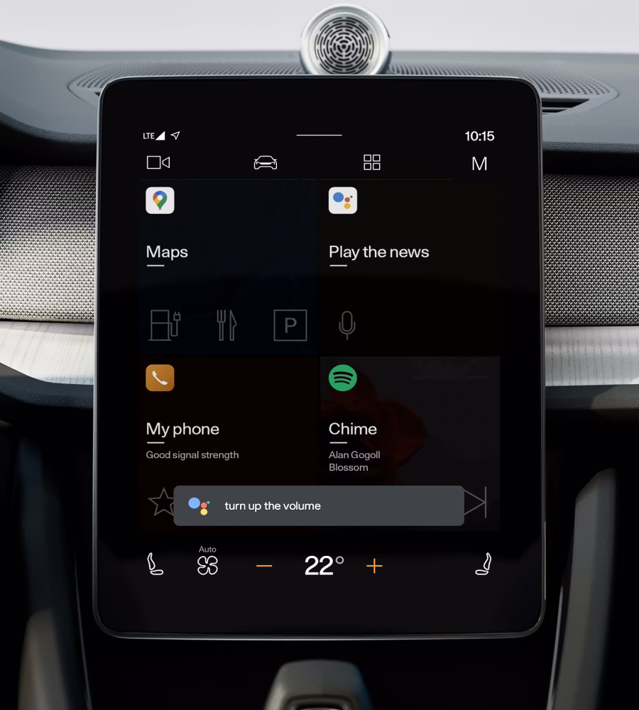 Polestar 2’s centre display showing the home screen with the Google Assistant voice prompt.