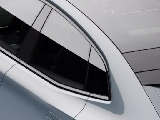 A top down view of back seat window of a grey Polestar 4