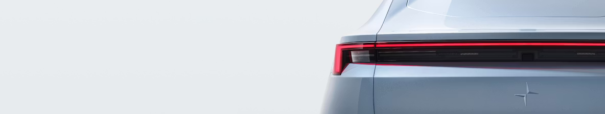 Blue Polestar 4 rear view close up in grey studio background