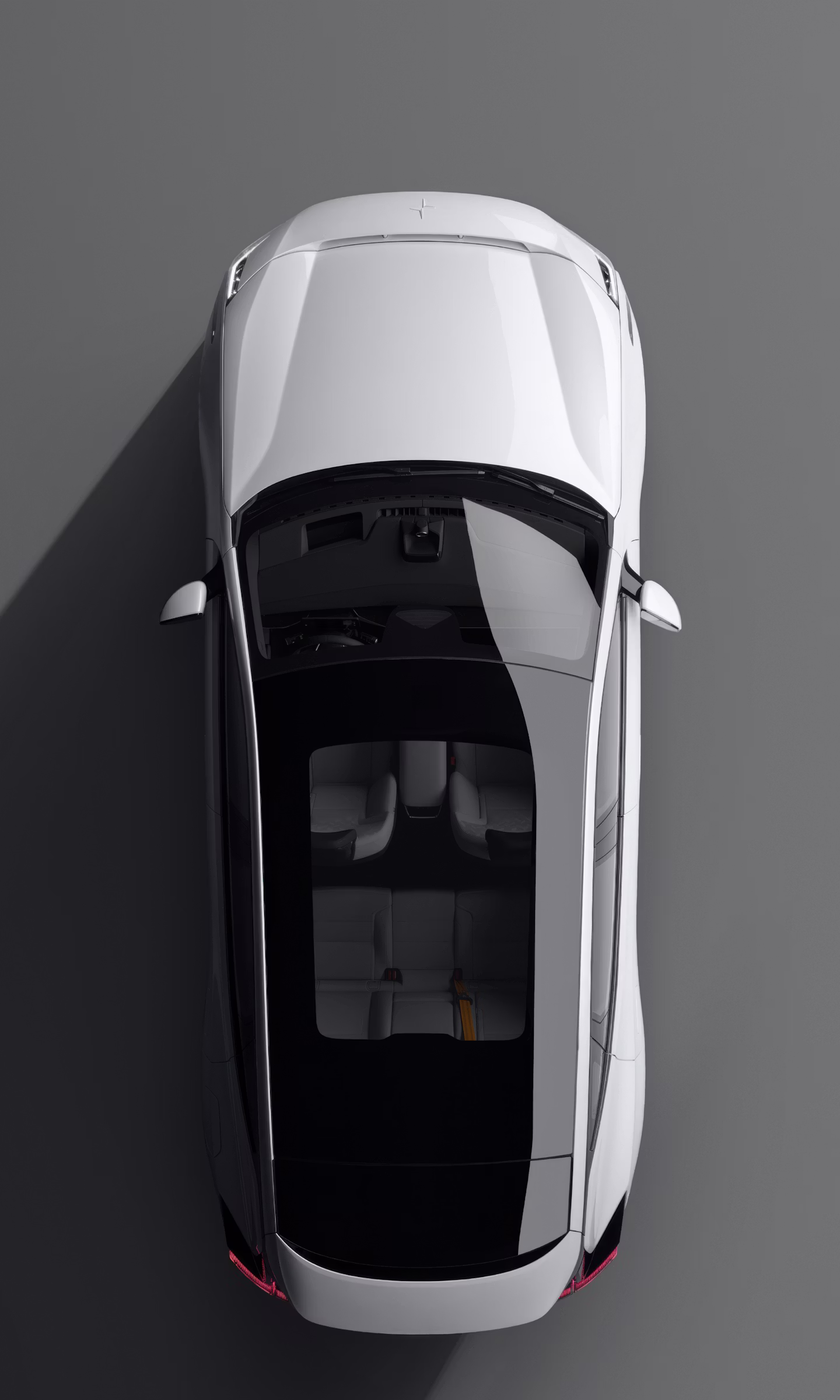 Bird’s eye view of Polestar 3 in Magnesium colour against a grey background.